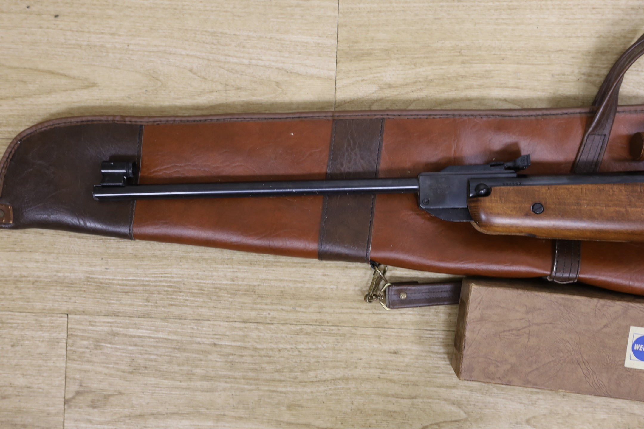 A Weirauch HW 95 .22 calibre air rifle with Picar 2 3/4 x 64 scope and slip case.